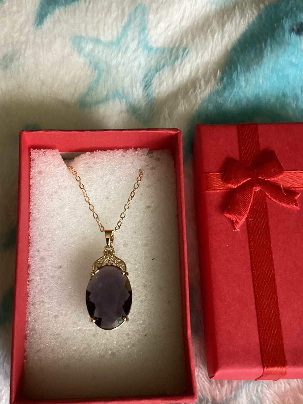 Gold-Tone Necklace with Deep Purple Oval Pendant